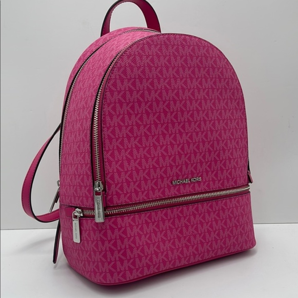 Michael Kors Rhea Medium Signature Logo Backpack
Dragonfruit
NWT